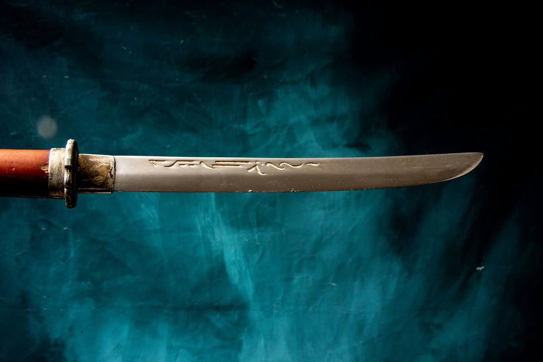 Sword resting on a surface showing handle and blade construction