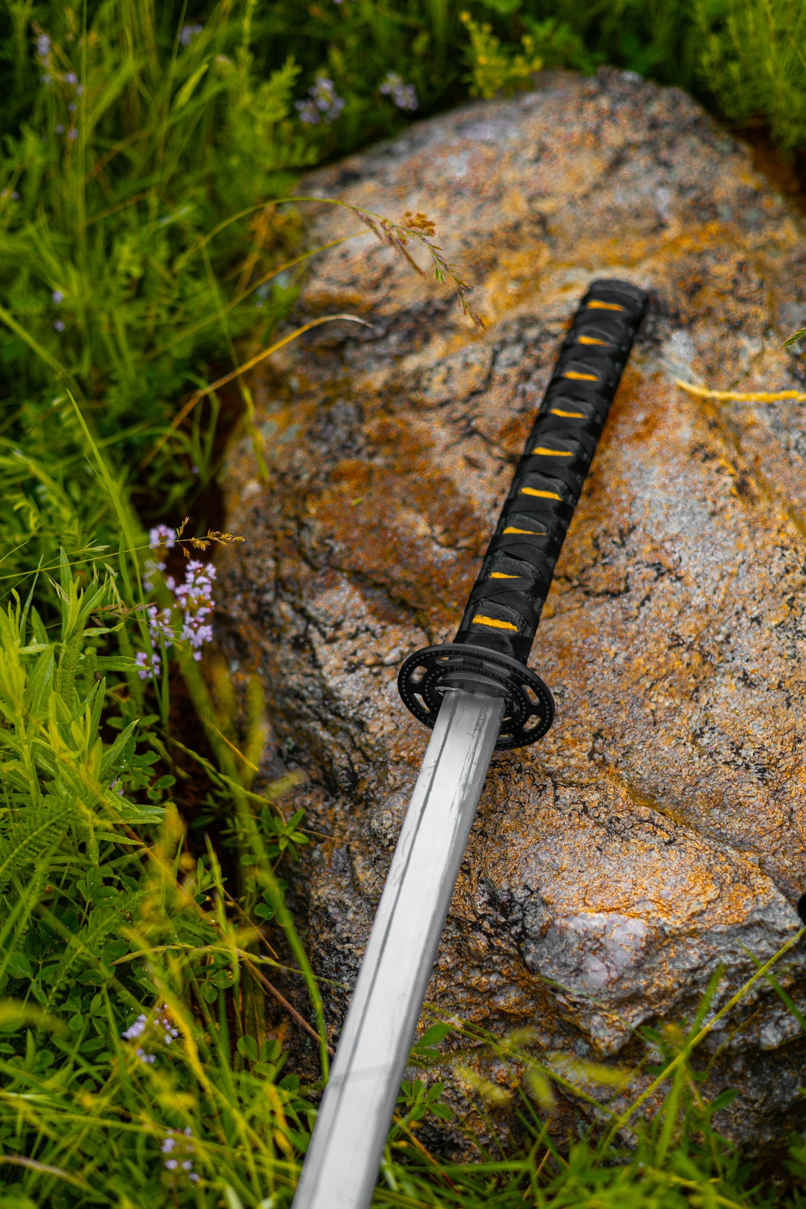 Katana resting on a rock